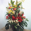 お祝い花にオススメ演台花のアレンジメント「祝福の思い」