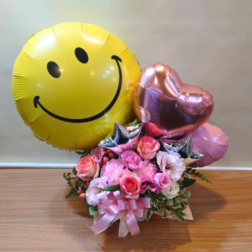キュートな「ニコちゃん」バルーンアレンジメント「Smile/スマイル」(ピンク)